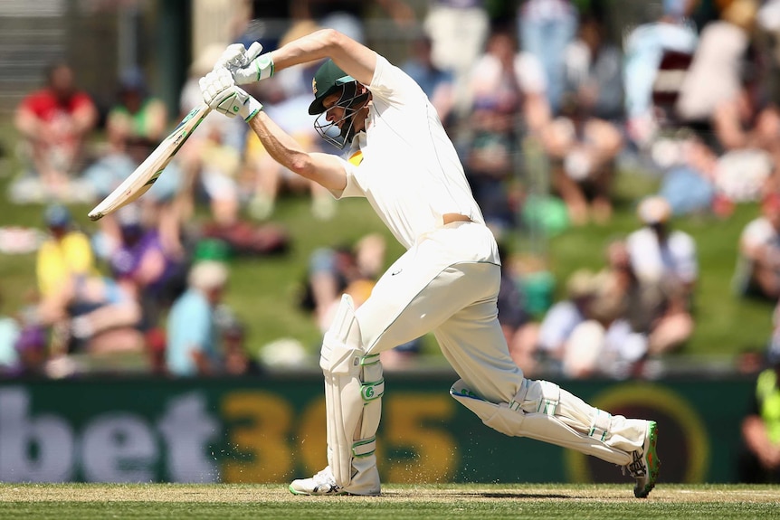 Adam Voges drives on day one against the West indies
