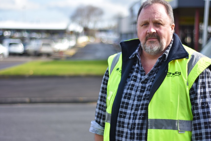 Man wearing CFMEU jacket