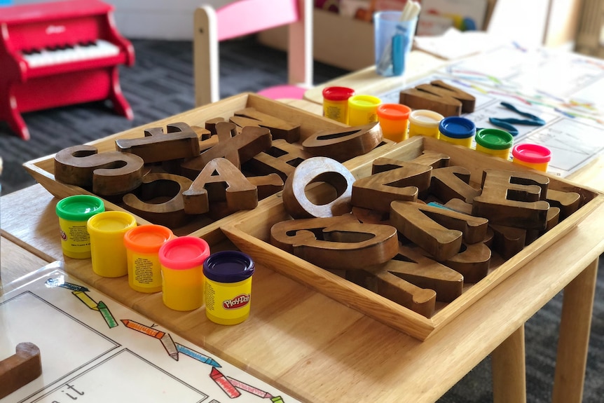 A table of activities at an empty childcare centre, with fewer kids due to the Delta outbreak of COVID-19.