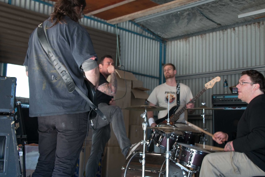Trystan Ford, Greg McManus, Glen Hurry and Luke Boyd jam in their back shed