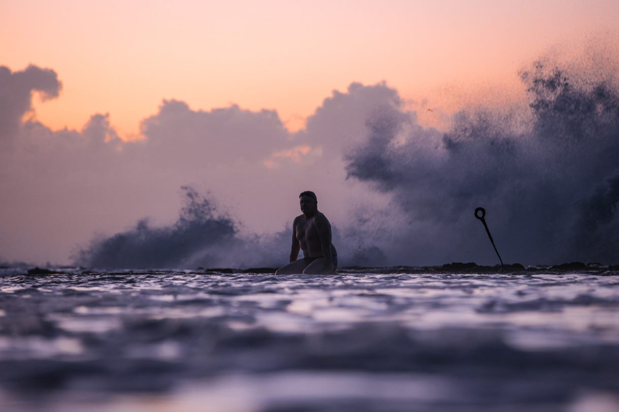 Wide shot of Paul Smith at the ocean baths 