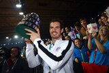 Andy Murray lifts the Davis Cup trophy after Britain's 2015 final victory over Belgium in Ghent.
