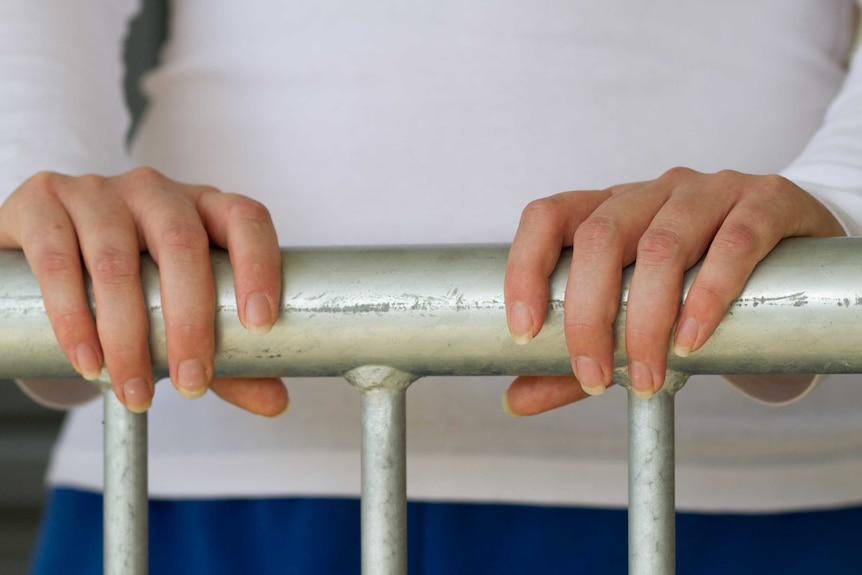 Close up of a prisoners hands