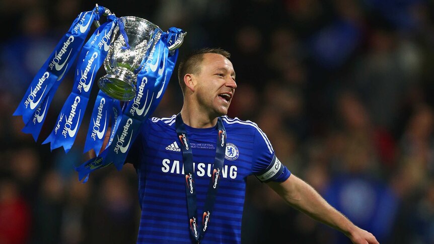 Captain John Terry of Chelsea celebrates with the trophy