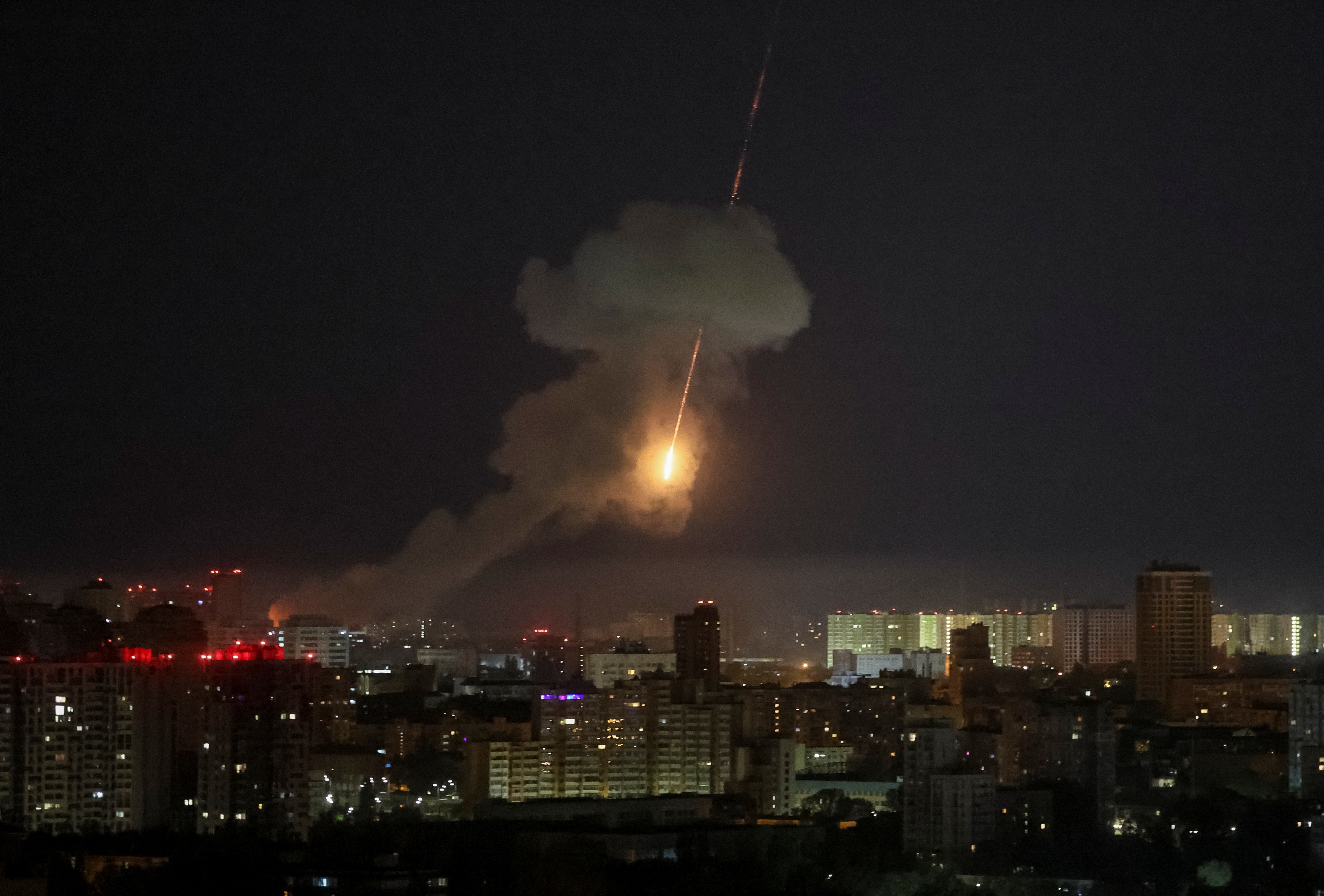 A ballistic missile crashing towards the Kyiv skyline.