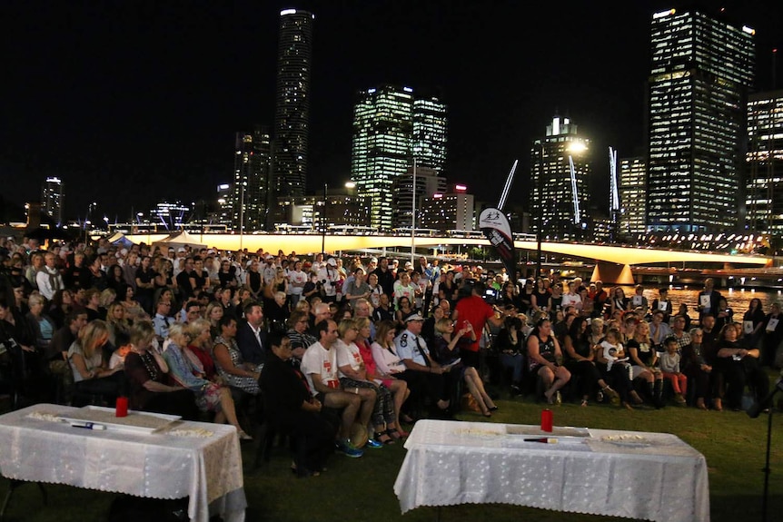 Hundreds of people on the riverside at Brisbane South Bank