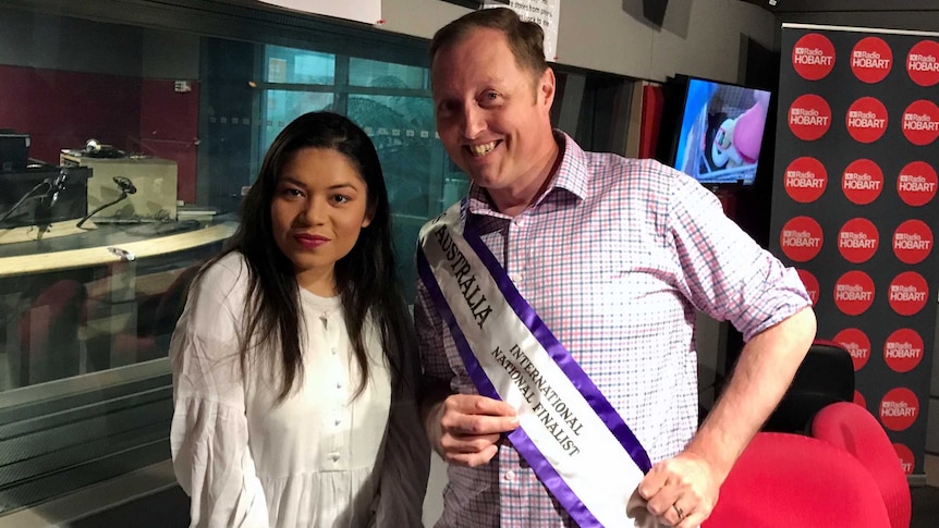 Manisha Gautam with Joel Rheinberger, who's wearing her Miss Australia sash