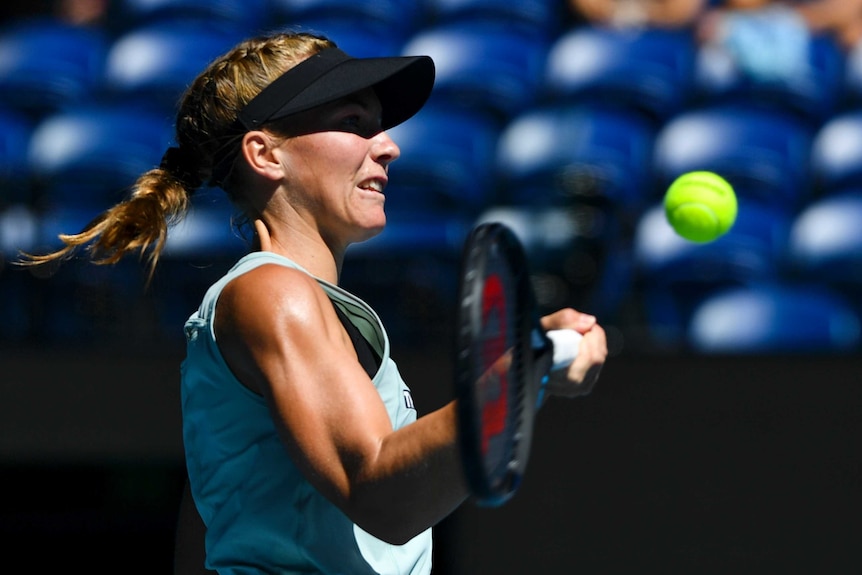 Maddison Inglis plays a forehand against Sofia Kenin at the Australian Open.