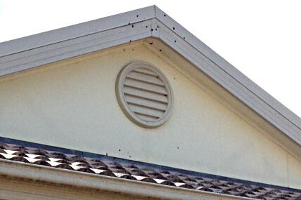 Bullet holes above the garage of a house in Rouse Hill.