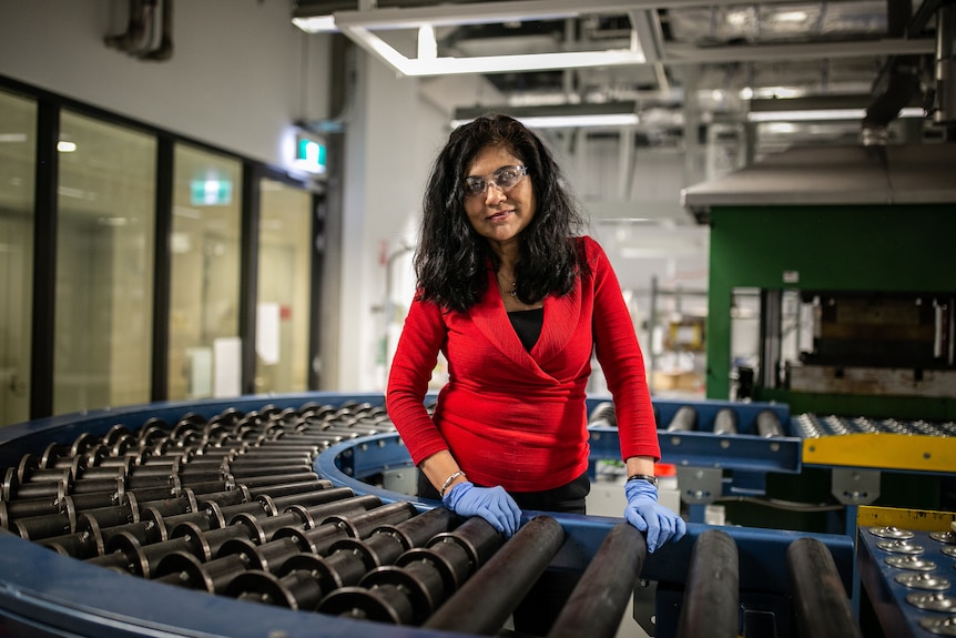 a woman in a laboratory looking ahead