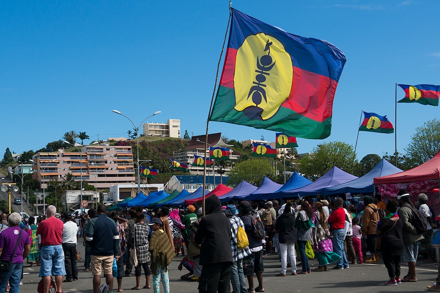 Crowds gather under pro-independence Kanak flags in Noumea ahead of New Caledonia's referendum.