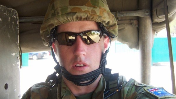 Brad Fewson in his army gear while serving in East Timor