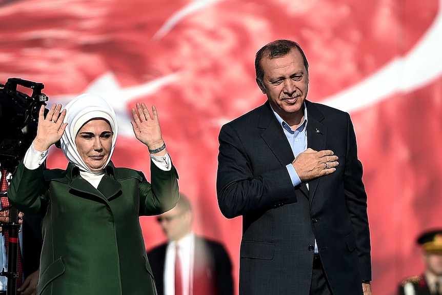 Turkish president Recep Tayyip Erdogan (R) and his wife Emine Erdogan (L)
