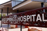 View of an Alice Springs Hospital sign at the entrance to the facility