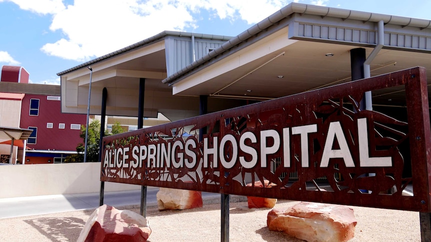 View of an Alice Springs Hospital sign at the entrance to the facility