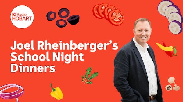 Joel Rheinberger stands with red background surrounded by graphics of vegtables