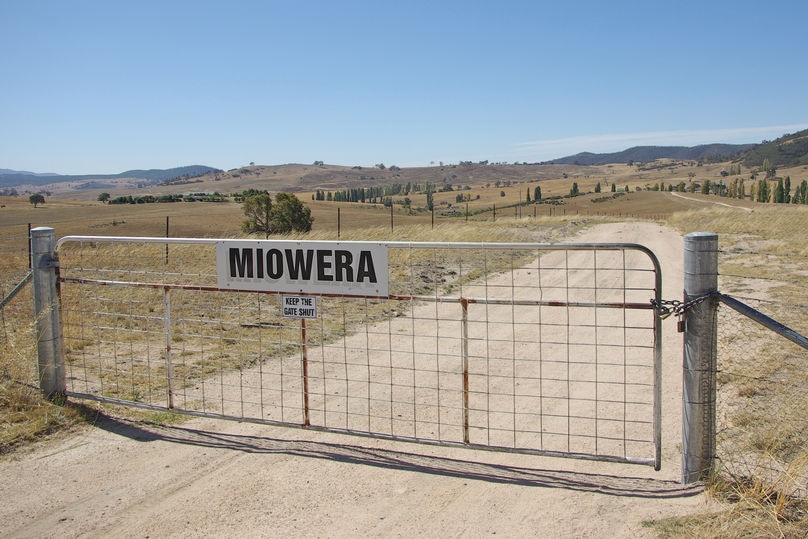 A gate with a sign reading Miowera.