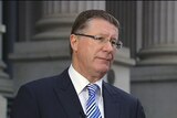 Victorian Premier Denis Napthine on the steps of Parliament.