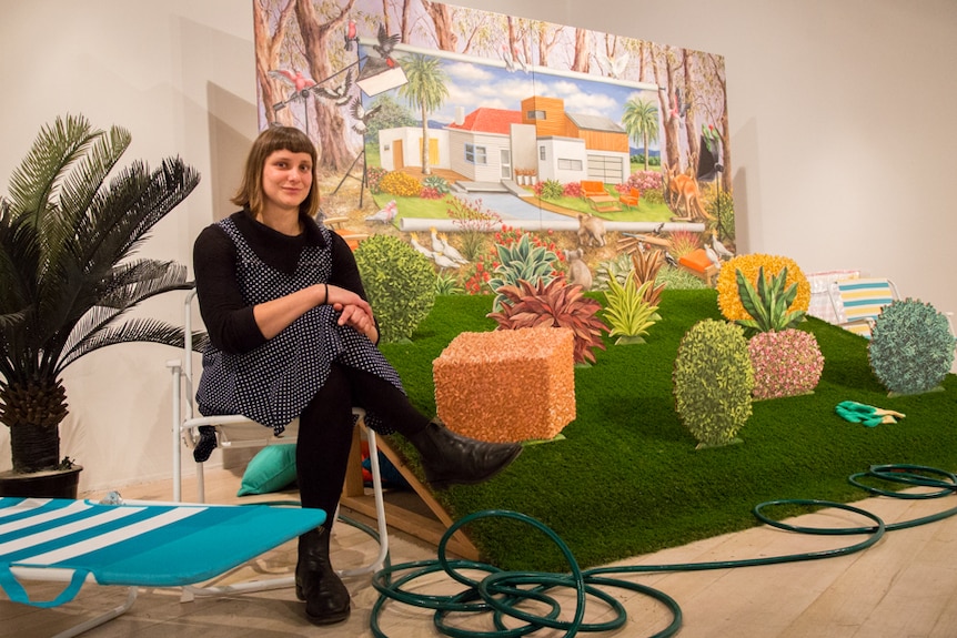 Local artist Amber Koroluk-Stephenson has painted suburban landscapes of houses.