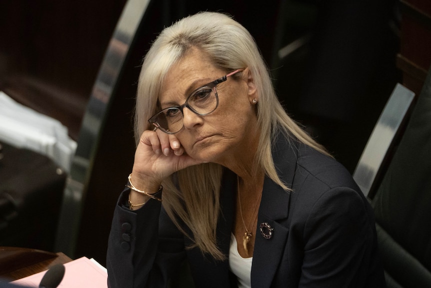 Elise Archer looking bored in parliament.