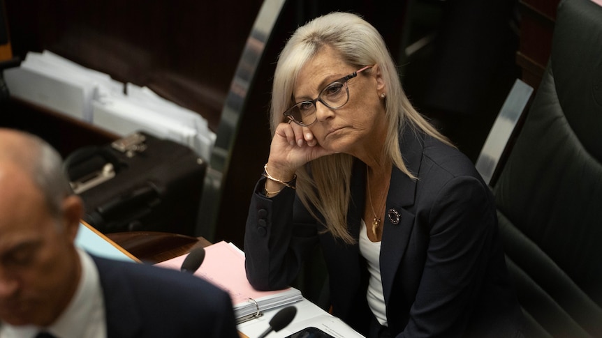 Elise Archer looking bored in parliament.