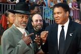 Ill with cancer ... Joe Frazier (L) poses alongside old rival Muhammad Ali in 2002.