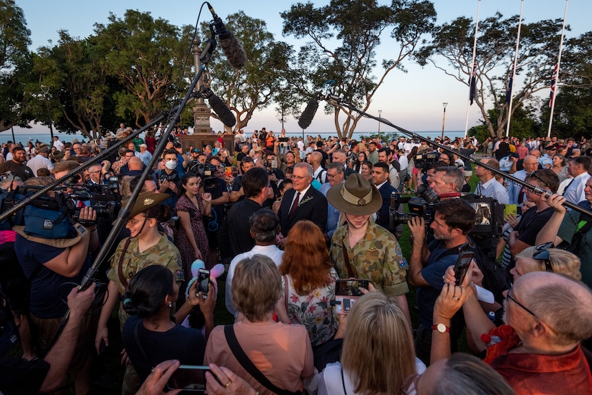 crowds gather around the prime minister