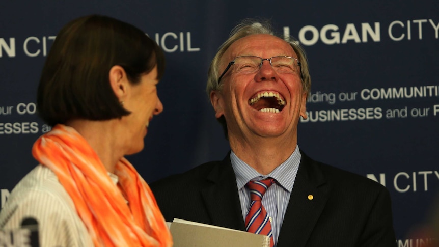 Peter Beattie laughs during a press conference to announce his 2013 election bid