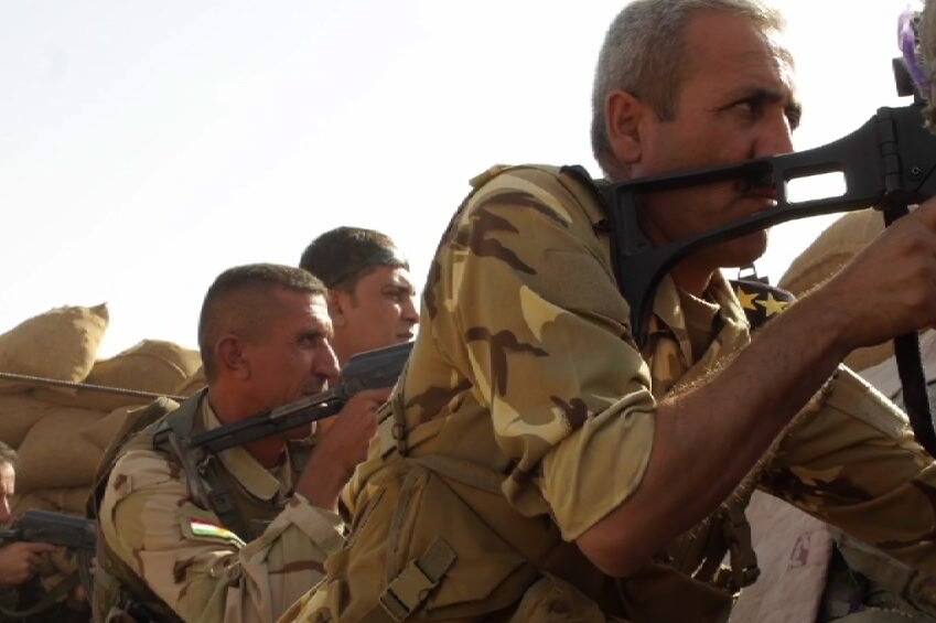 Frontline Peshmerga fighters prepare for battle.