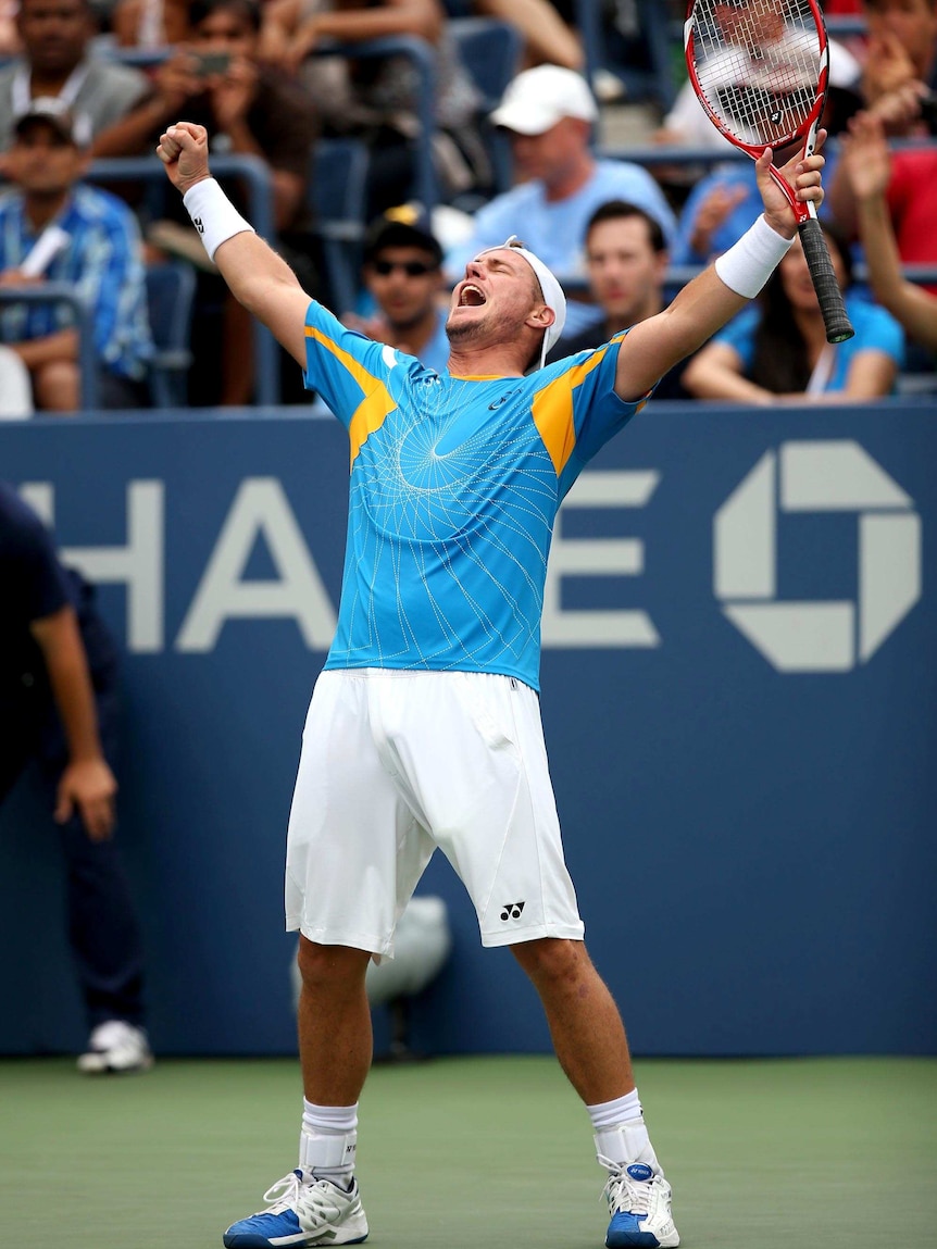 Lleyton Hewitt celebrates winning his match against Evgeny Donskoy at the US Open.