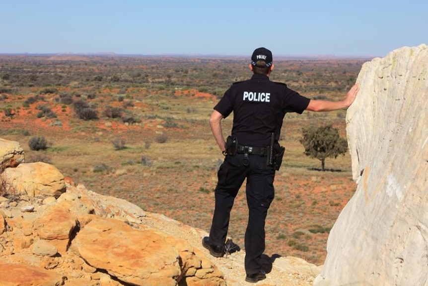 NT Police officer in remote location generic image.