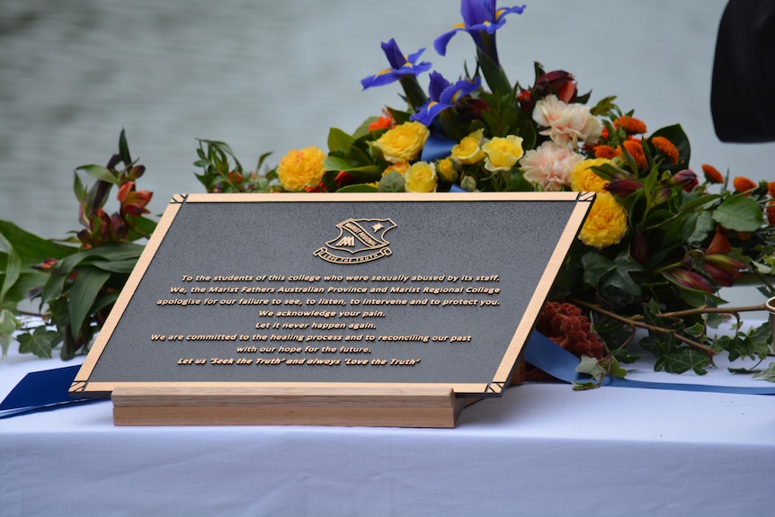 A memorial plaque with text.