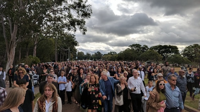 Alice Eather funeral attendees walk
