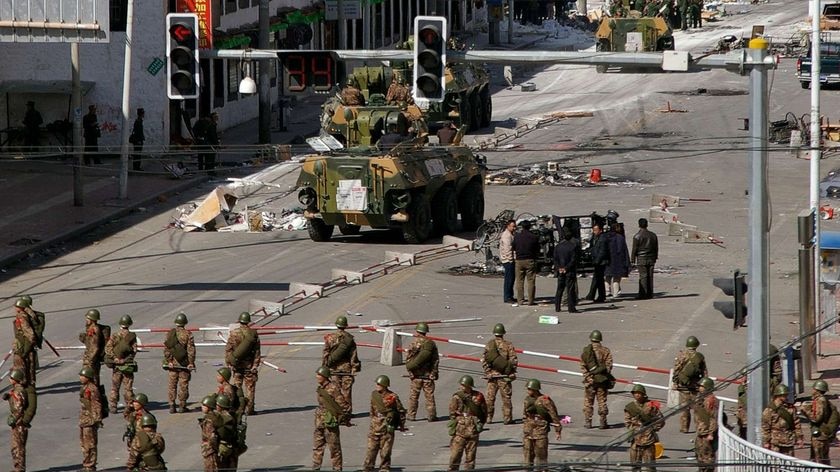 Chinese troops and tanks patrol the streets of Tibetan capital Lhasa