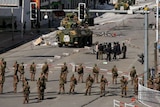 Chinese troops and tanks patrol the streets of Tibetan capital Lhasa