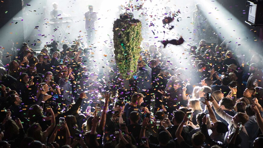 People celebrated at midnight in Toronto to mark the first day of the legalisation of cannabis.
