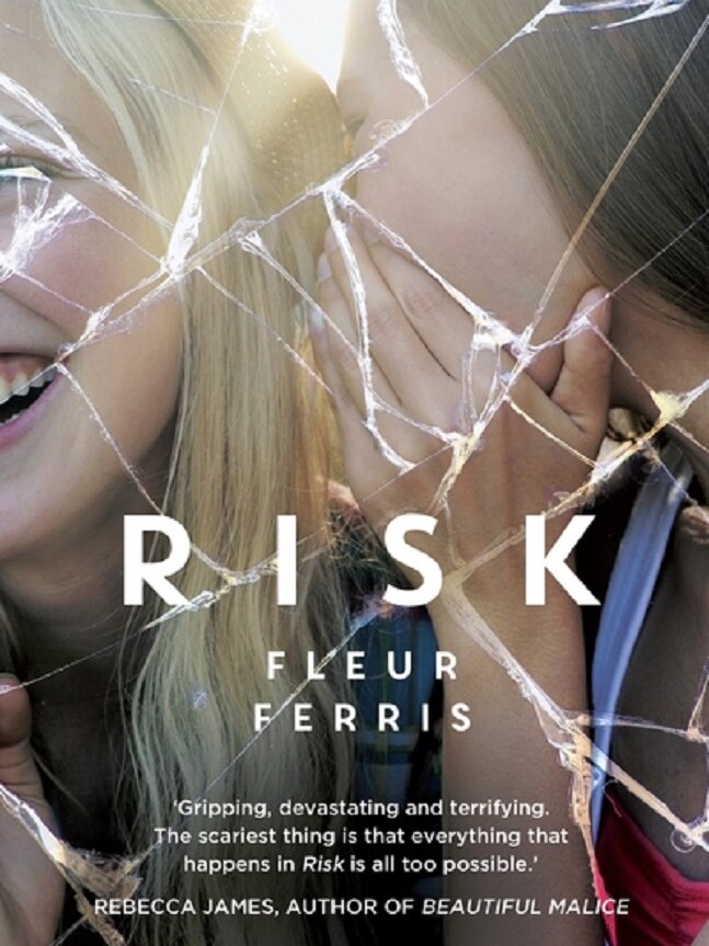 Book cover of Risk showing two teenage girls whispering and laughing.