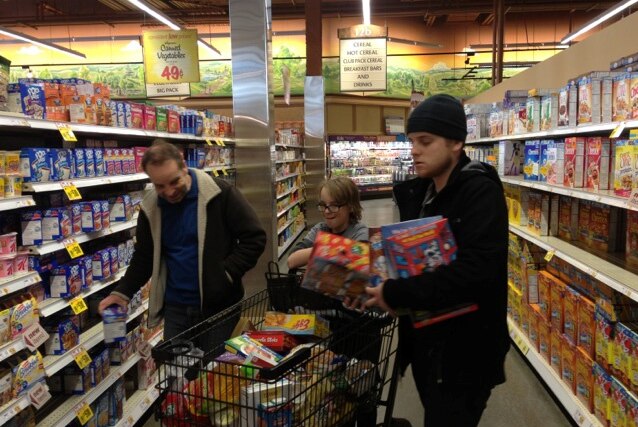Ed Oxenbould shopping with his family
