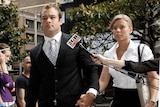 Brett Stewart and Jamie Baker arrive at the Downing Centre Local Court