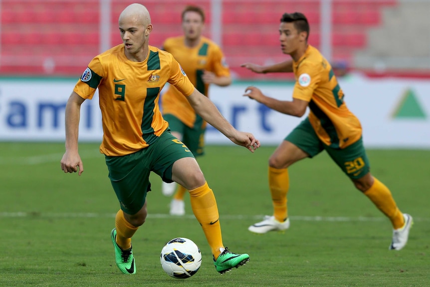 Dylan Tombides on the ball for Australia's under-22 side against Kuwait