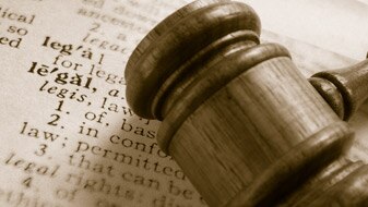 Gavel with law definition (Thinkstock: Hemera)