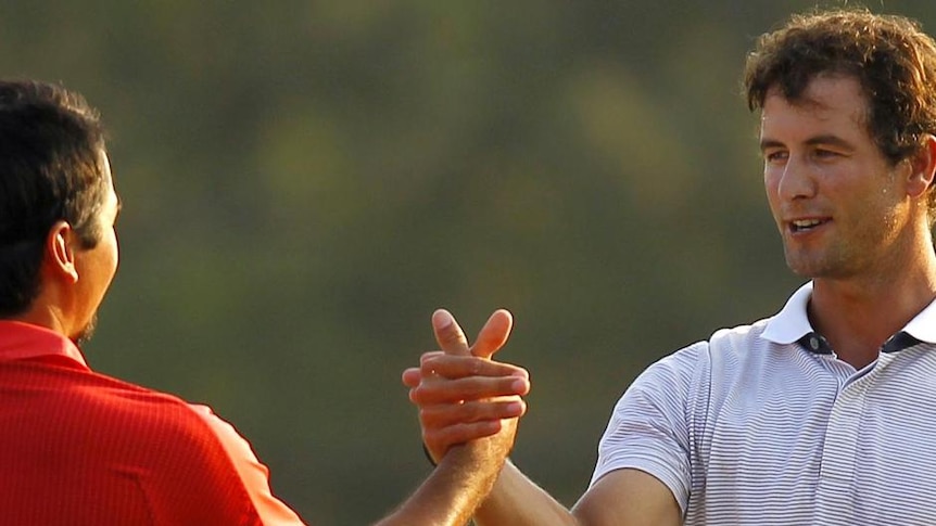 Jason Day (L) and Adam Scott (R) finish joint second at the 2011 Masters at Augusta.