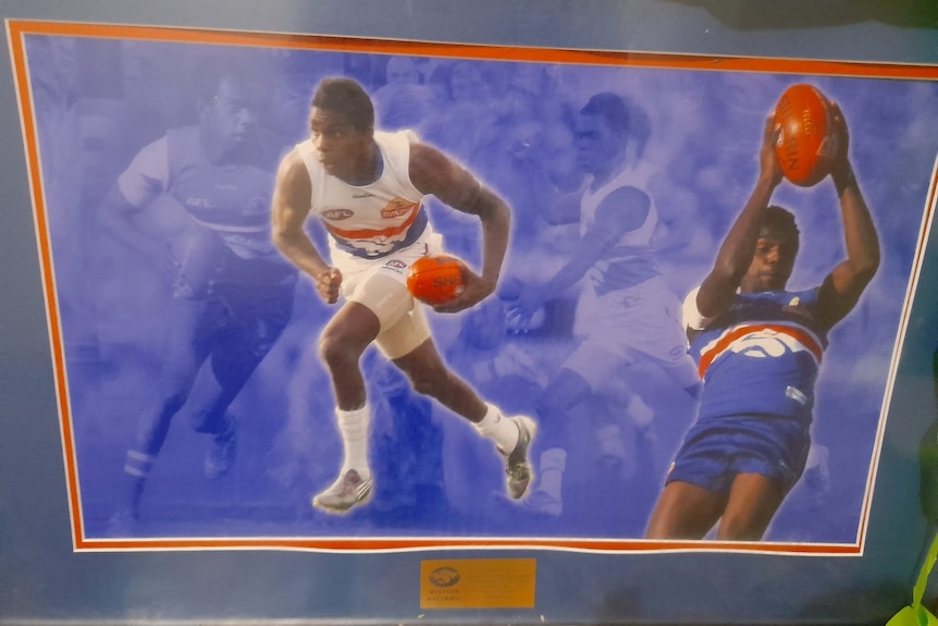 Images of an Aboriginal footballer in a Western Bulldogs guernsey, in a picture frame with a plaque underneath