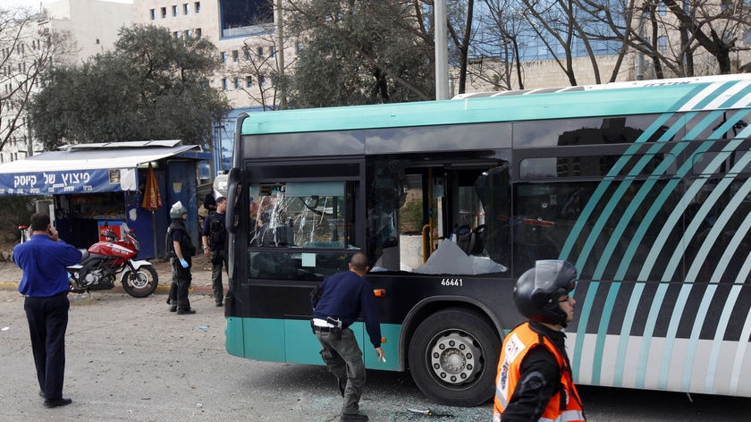 A damaged bus at the site of an explosion in Jerusalem