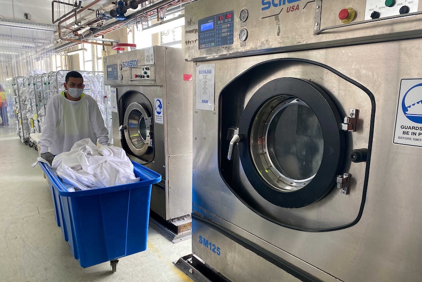 Inside a commercial laundry.