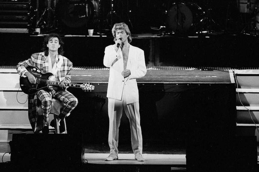 George Michael and Andrew Ridgley perform on stage in Peking.