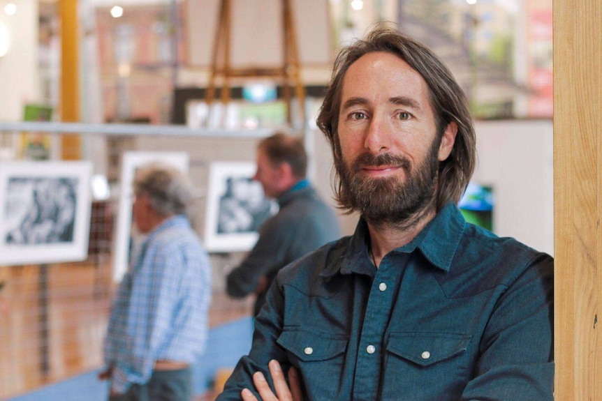 Paul Hoelen at the exhibition of his photographs Men with Heart Hobart, October 2018