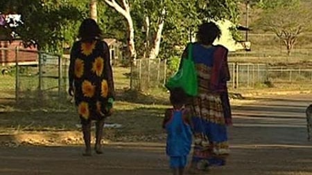 Indigenous women and child in a remote NT community.