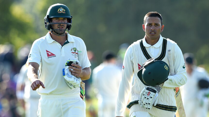 Australian batsmen Joe Burns and Usman Khawaja walk off Hagley Oval after day four of second Test.