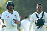 Australian batsmen Joe Burns and Usman Khawaja walk off Hagley Oval after day four of second Test.